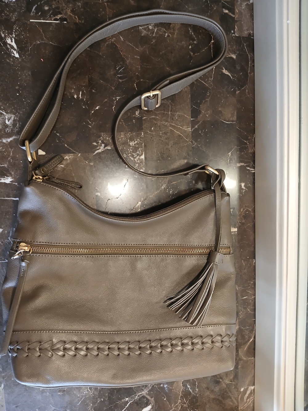 Taupe Leather Crossbody Bag with Tassel Accent